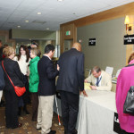 Guests checking in to the 2013 Redefining Vision Luncheon