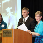 Keynote Speaker Brett Lewis selects the winner of the Braille Raffle prize