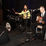 Lighthouse employees Peggy Martinez (left) and Andrew Stauffer (right) provided some musical entertainment for guests at the Redefining Vision Luncheon.