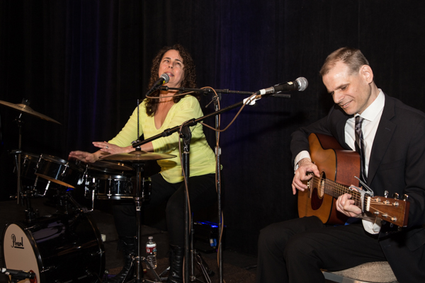 Lighthouse employees Peggy Martinez (left) and Andrew Stauffer (right) provided some musical entertainment for guests at the Redefining Vision Luncheon.