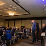 A standing ovation was given to the three employees featured in the video presentation during the event.